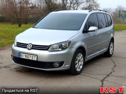 Серый Фольксваген Туран, объемом двигателя 2 л и пробегом 300 тыс. км за 10999 $, фото 1 на Automoto.ua