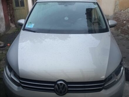 Серый Фольксваген Туран, объемом двигателя 1.4 л и пробегом 200 тыс. км за 12880 $, фото 1 на Automoto.ua