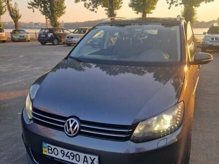 Серый Фольксваген Туран, объемом двигателя 1.97 л и пробегом 325 тыс. км за 14000 $, фото 1 на Automoto.ua