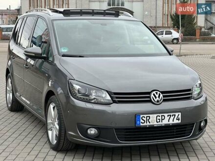 Серый Фольксваген Туран, объемом двигателя 2 л и пробегом 167 тыс. км за 14650 $, фото 1 на Automoto.ua