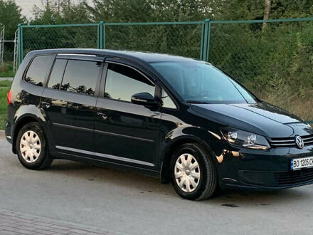 Фольксваген Туран 2015 в Тернополе на Automoto.ua Серый Фольксваген Туран, объемом двигателя 1.6 л и пробегом 285 тыс. км за 12700 $, фото 1 на Automoto.ua