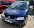 Синий Фольксваген Туран, объемом двигателя 2 л и пробегом 270 тыс. км за 5300 $, фото 1 на Automoto.ua