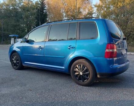 Синий Фольксваген Туран, объемом двигателя 1.6 л и пробегом 242 тыс. км за 5800 $, фото 3 на Automoto.ua