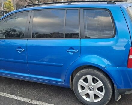 Синий Фольксваген Туран, объемом двигателя 1.6 л и пробегом 260 тыс. км за 5500 $, фото 1 на Automoto.ua