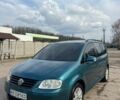 Синій Фольксваген Туран, об'ємом двигуна 1.6 л та пробігом 203 тис. км за 6750 $, фото 1 на Automoto.ua