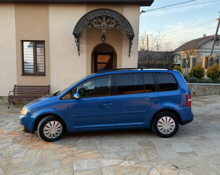 Синий Фольксваген Туран, объемом двигателя 1.6 л и пробегом 202 тыс. км за 4900 $, фото 5 на Automoto.ua