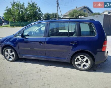 Синий Фольксваген Туран, объемом двигателя 1.6 л и пробегом 292 тыс. км за 5600 $, фото 3 на Automoto.ua