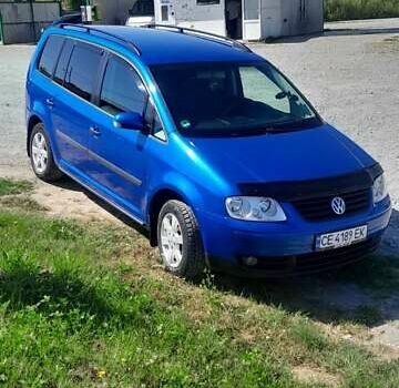 Синий Фольксваген Туран, объемом двигателя 1.6 л и пробегом 213 тыс. км за 5600 $, фото 5 на Automoto.ua