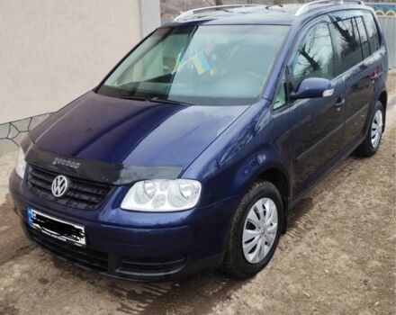 Синий Фольксваген Туран, объемом двигателя 1.9 л и пробегом 3 тыс. км за 5500 $, фото 7 на Automoto.ua