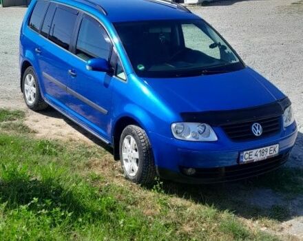 Синий Фольксваген Туран, объемом двигателя 1.6 л и пробегом 214 тыс. км за 5600 $, фото 1 на Automoto.ua