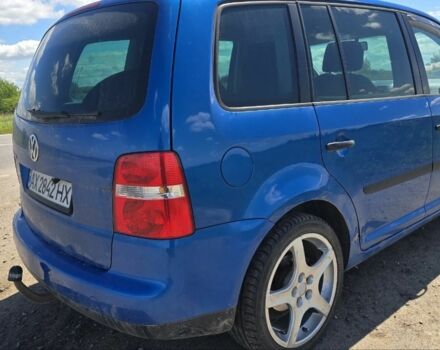 Синий Фольксваген Туран, объемом двигателя 1.6 л и пробегом 312 тыс. км за 5300 $, фото 4 на Automoto.ua