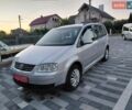 Синий Фольксваген Туран, объемом двигателя 1.6 л и пробегом 209 тыс. км за 4400 $, фото 1 на Automoto.ua