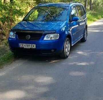 Синий Фольксваген Туран, объемом двигателя 1.6 л и пробегом 213 тыс. км за 5600 $, фото 2 на Automoto.ua