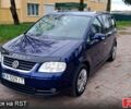 Синий Фольксваген Туран, объемом двигателя 2 л и пробегом 299 тыс. км за 4900 $, фото 1 на Automoto.ua