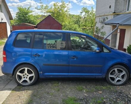 Синий Фольксваген Туран, объемом двигателя 1.6 л и пробегом 312 тыс. км за 5300 $, фото 3 на Automoto.ua