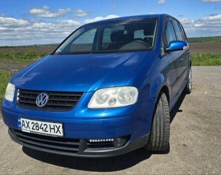 Синий Фольксваген Туран, объемом двигателя 1.6 л и пробегом 312 тыс. км за 5300 $, фото 1 на Automoto.ua