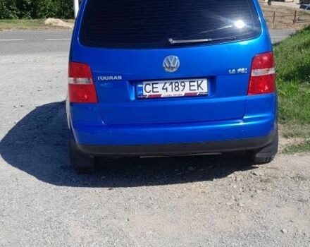 Синий Фольксваген Туран, объемом двигателя 1.6 л и пробегом 214 тыс. км за 5600 $, фото 2 на Automoto.ua