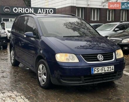 Синий Фольксваген Туран, объемом двигателя 1.9 л и пробегом 228 тыс. км за 3999 $, фото 20 на Automoto.ua
