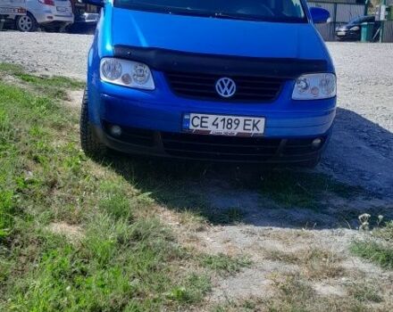 Синий Фольксваген Туран, объемом двигателя 1.6 л и пробегом 214 тыс. км за 5600 $, фото 4 на Automoto.ua