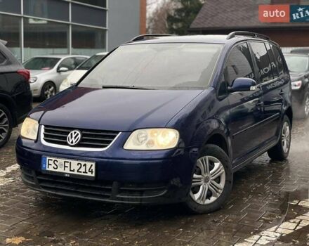 Синий Фольксваген Туран, объемом двигателя 1.9 л и пробегом 228 тыс. км за 3999 $, фото 2 на Automoto.ua