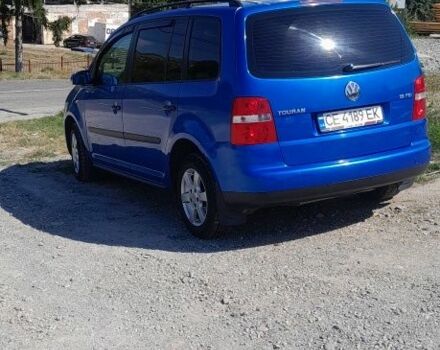 Синий Фольксваген Туран, объемом двигателя 1.6 л и пробегом 214 тыс. км за 5600 $, фото 3 на Automoto.ua