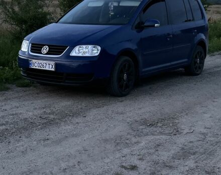 Синий Фольксваген Туран, объемом двигателя 1.6 л и пробегом 263 тыс. км за 6000 $, фото 2 на Automoto.ua