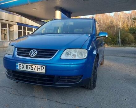 Синий Фольксваген Туран, объемом двигателя 1.6 л и пробегом 242 тыс. км за 5800 $, фото 1 на Automoto.ua
