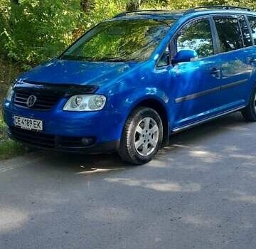 Синий Фольксваген Туран, объемом двигателя 1.6 л и пробегом 213 тыс. км за 5600 $, фото 1 на Automoto.ua