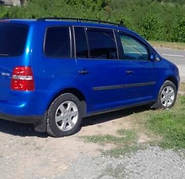 Синий Фольксваген Туран, объемом двигателя 1.6 л и пробегом 213 тыс. км за 5600 $, фото 3 на Automoto.ua