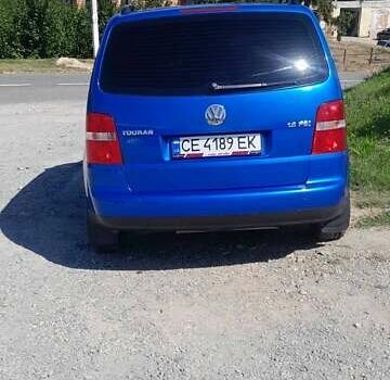 Синий Фольксваген Туран, объемом двигателя 1.6 л и пробегом 213 тыс. км за 5600 $, фото 4 на Automoto.ua