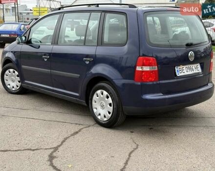Синий Фольксваген Туран, объемом двигателя 1.6 л и пробегом 246 тыс. км за 5800 $, фото 5 на Automoto.ua