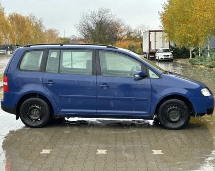 Синій Фольксваген Туран, об'ємом двигуна 2 л та пробігом 250 тис. км за 1850 $, фото 5 на Automoto.ua