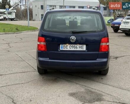 Синий Фольксваген Туран, объемом двигателя 1.6 л и пробегом 246 тыс. км за 5800 $, фото 4 на Automoto.ua