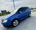 Синий Фольксваген Туран, объемом двигателя 2 л и пробегом 300 тыс. км за 4900 $, фото 3 на Automoto.ua