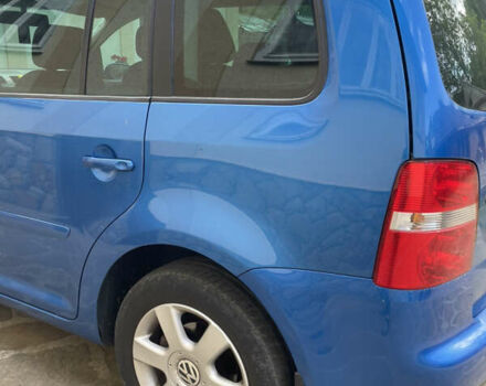 Синий Фольксваген Туран, объемом двигателя 1.6 л и пробегом 274 тыс. км за 5700 $, фото 2 на Automoto.ua