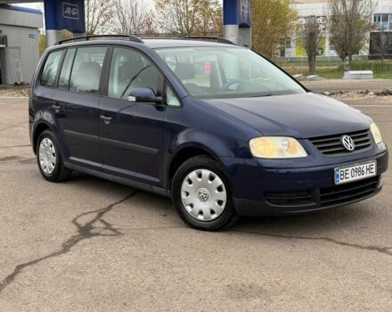 Синий Фольксваген Туран, объемом двигателя 1.6 л и пробегом 246 тыс. км за 5800 $, фото 2 на Automoto.ua