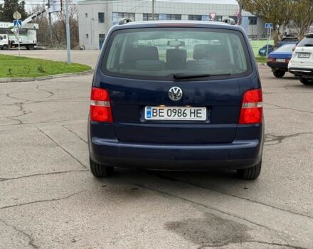 Синий Фольксваген Туран, объемом двигателя 1.6 л и пробегом 246 тыс. км за 5800 $, фото 4 на Automoto.ua