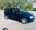 Синій Фольксваген Туран, об'ємом двигуна 1.97 л та пробігом 282 тис. км за 4600 $, фото 1 на Automoto.ua