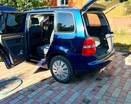 Синий Фольксваген Туран, объемом двигателя 1.6 л и пробегом 284 тыс. км за 7000 $, фото 4 на Automoto.ua