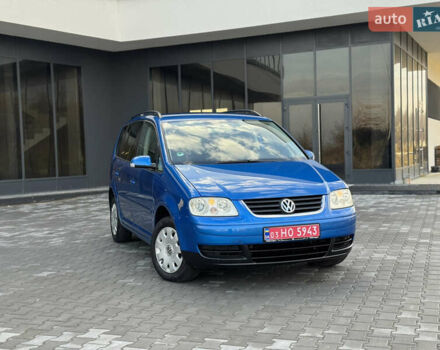 Синий Фольксваген Туран, объемом двигателя 1.6 л и пробегом 250 тыс. км за 5450 $, фото 1 на Automoto.ua