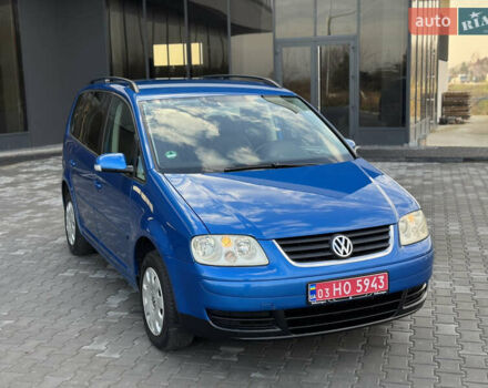 Синий Фольксваген Туран, объемом двигателя 1.6 л и пробегом 250 тыс. км за 5450 $, фото 5 на Automoto.ua