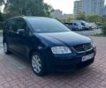 Синий Фольксваген Туран, объемом двигателя 2 л и пробегом 231 тыс. км за 2900 $, фото 1 на Automoto.ua
