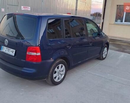 Синий Фольксваген Туран, объемом двигателя 1.6 л и пробегом 220 тыс. км за 6500 $, фото 2 на Automoto.ua