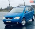 Синий Фольксваген Туран, объемом двигателя 2 л и пробегом 330 тыс. км за 5800 $, фото 1 на Automoto.ua