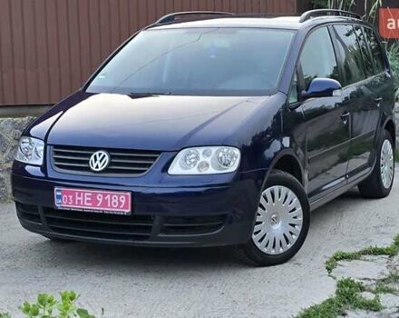 Синий Фольксваген Туран, объемом двигателя 1.6 л и пробегом 262 тыс. км за 6499 $, фото 3 на Automoto.ua