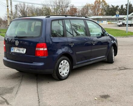 Синий Фольксваген Туран, объемом двигателя 1.6 л и пробегом 246 тыс. км за 5800 $, фото 3 на Automoto.ua