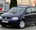 Синий Фольксваген Туран, объемом двигателя 1.6 л и пробегом 217 тыс. км за 6650 $, фото 1 на Automoto.ua