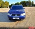 Синий Фольксваген Туран, объемом двигателя 2 л и пробегом 318 тыс. км за 5800 $, фото 1 на Automoto.ua