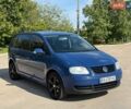 Синий Фольксваген Туран, объемом двигателя 1.6 л и пробегом 235 тыс. км за 4900 $, фото 5 на Automoto.ua