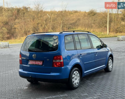 Синий Фольксваген Туран, объемом двигателя 1.6 л и пробегом 250 тыс. км за 5450 $, фото 2 на Automoto.ua